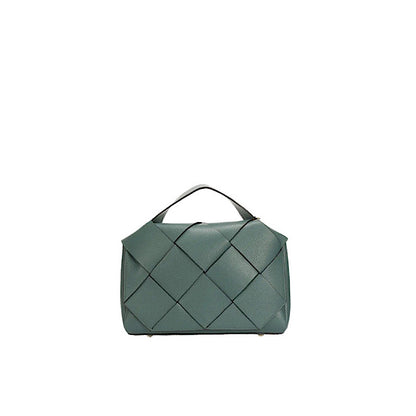 Teal blue leather handbag.
 Made in Europe.