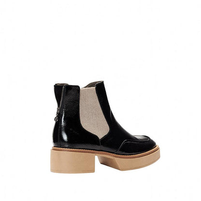 Bottes Softwaves en cuir verni noir. - Boutique Prestige