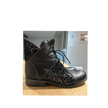 *presque tout vendu* 
Bottes lacées Portofino en cuir noir et motifs argentés. - Boutique Prestige